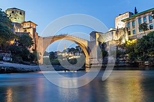 Evening view of Stari most (Old Bridge) and old stone buildings in Mostar. Bosnia and Herzegovi