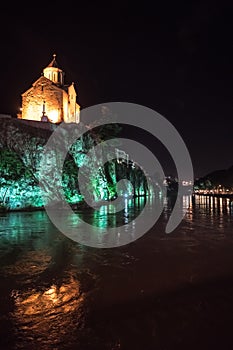 Evening view of Tbilisi and the Kura river at dusk