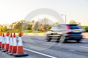 Evening view UK Motorway Traffic Roadworks Cones