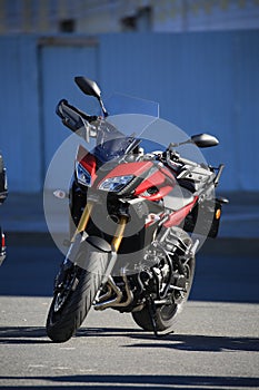 Red and black motorcycle Yamaha Tracer MT-09, front view