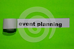 Event Planning, business concept on green torn paper