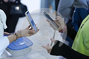 Event QR code ticket scanning. Businessman registering for a business conference using his smart phone