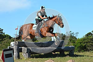 Eventer jumping logs