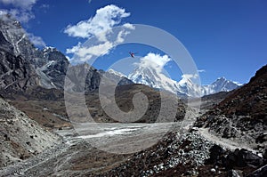 Everest trek, Helicopter flying over valley Himalayas mountains, Sagarmatha national park, Solukhumbu, Nepal