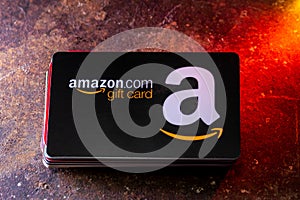 Amazon Gift Card on Top of A Stack of Credit Cards