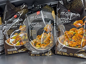 Everett, WA USA - circa August 2022: Angled, selective focus on P. F. Changs freezer meals for sale inside an Albertsons grocery