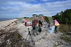 Young adults camping on beach in Middle Cape Sable in Everglades National Park.