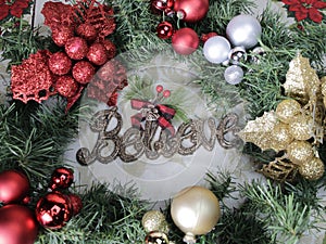 Evergreen Christmas wreath, jingle bells, BELIEVE in the magic, spirit