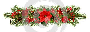 Evergreen twigs of Christmas tree and decorations in a festive garland photo
