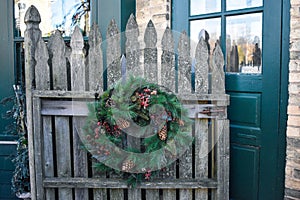 Evergreen Wreath Hanging on a Gate