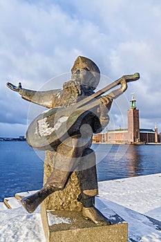 Evert`s monument on the background of the town hall in Stockholm