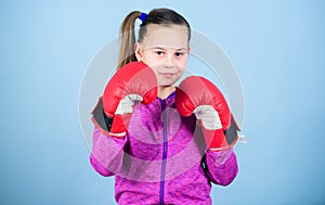 Every day filled with sport. punching knockout. Childhood activity. Happy child sportsman in boxing gloves. workout of