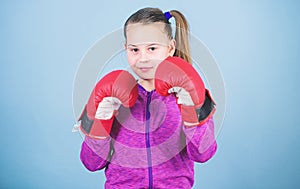 Every day filled with sport. punching knockout. Childhood activity. Happy child sportsman in boxing gloves. workout of