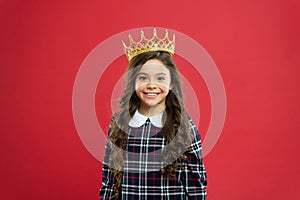Every girl dreaming to become princess. Lady little princess. Girl wear crown red background. Monarch family concept