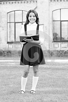 Every student matters, every moment counts. School education concept. Knowledge day. Cute smiling child hold book