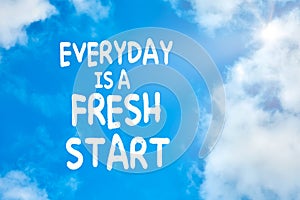 Everyday is a fresh start motivational or inspirational quote against blue sky with clouds