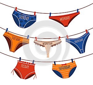 Everyday underwear. Doodle knickers and briefs laundry hanging on ropes. Undies and panties fixed on clothesline with