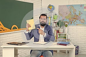 Everyone Is an Achiever. pass the exam. learning the subject. serious man with beard look at notebook. troubles in