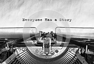 Everyone Has a Story typed words on a vintage typewriter