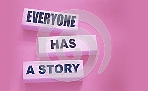 Everyone Has a Story word written on wood block. Storytelling copywriting business concept