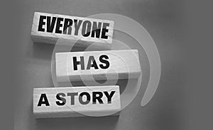 Everyone Has a Story word written on wood block. Storytelling copywriting business concept