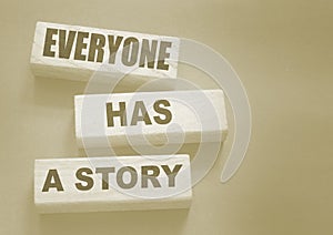 Everyone Has a Story word written on wood block. Storytelling copywriting business concept