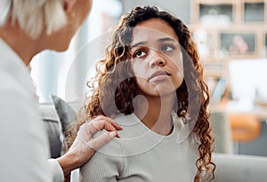 Everyone makes mistakes. an attractive young woman sitting with her psychologist and looking upset during her