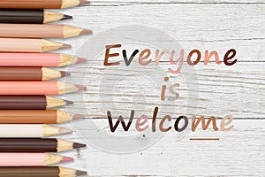 Everyone is Welcome message with multiculture skin tone color pencils crayons photo