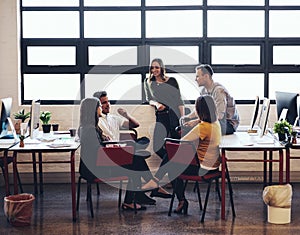 Everyones ideas matter in this company. creative employees having a meeting in a modern office.