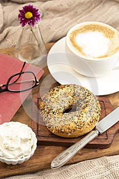 An Everything Bagel Coffee and Book for Breakfast