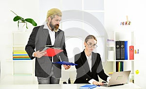 Everything looks great. man and woman brainstorming in office. collaboration and team building concept. businessman and