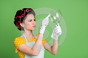 Everything perfect. Serious professional clean service worker retro vintage girl wash whine glass touch finger wear