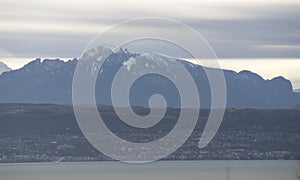 Evian-les-Bains , France, under snowy Alps