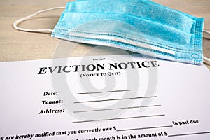 Eviction notice, notice to quit document with facial mask