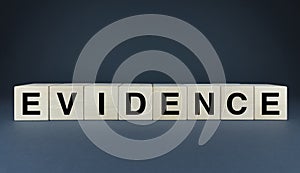 Evidence. Cubes form the word Evidence
