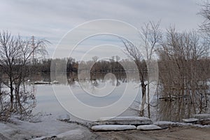 Evidence of river bank erosion in East Selkirk, Manitoba, Canada April 10, 2022