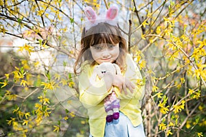 Evil child wearing bunny ears