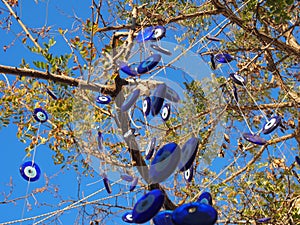 Evil eyes are hung in decorative purpose,Cunda island,Turkey photo