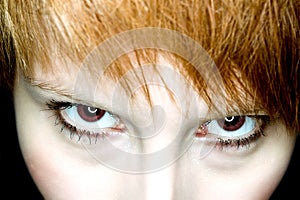 Evil female vampire eyes watching