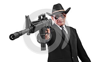 Evil gangster and his gun, isolated on white