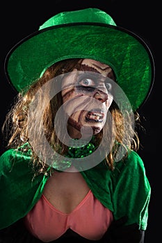 Evil green goblin girl, black background