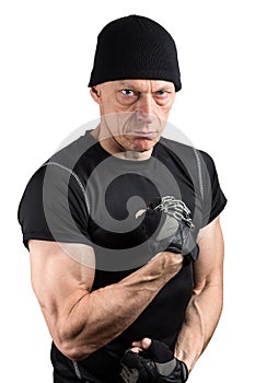 Evil man in black with chain wound on hand