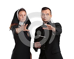 Evil priest and nun on a white background.