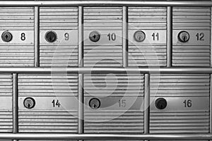 Black and white texture of post office mailboxes