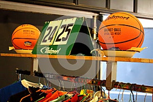 Old basketballs and scoreboards at a vintage market photo