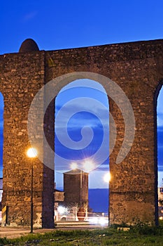 Evora aqueduct by night photo