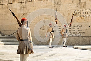Evzones, members of the greek presidential guard, which guards the greek tomb of the unknown soldier.