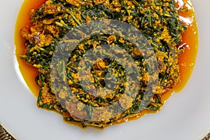 Ewuro or bitterleaf Egusi soup shared in a dish