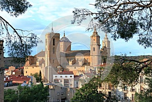 Ex colegiata de Santa Maria la Mayor, church towering over Alaniz, Teruel, Aragon, Spain photo