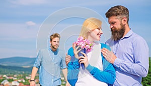 Ex partner watching girl starts happy love relations. Couple in love dating outdoor sunny day, sky background. Leave